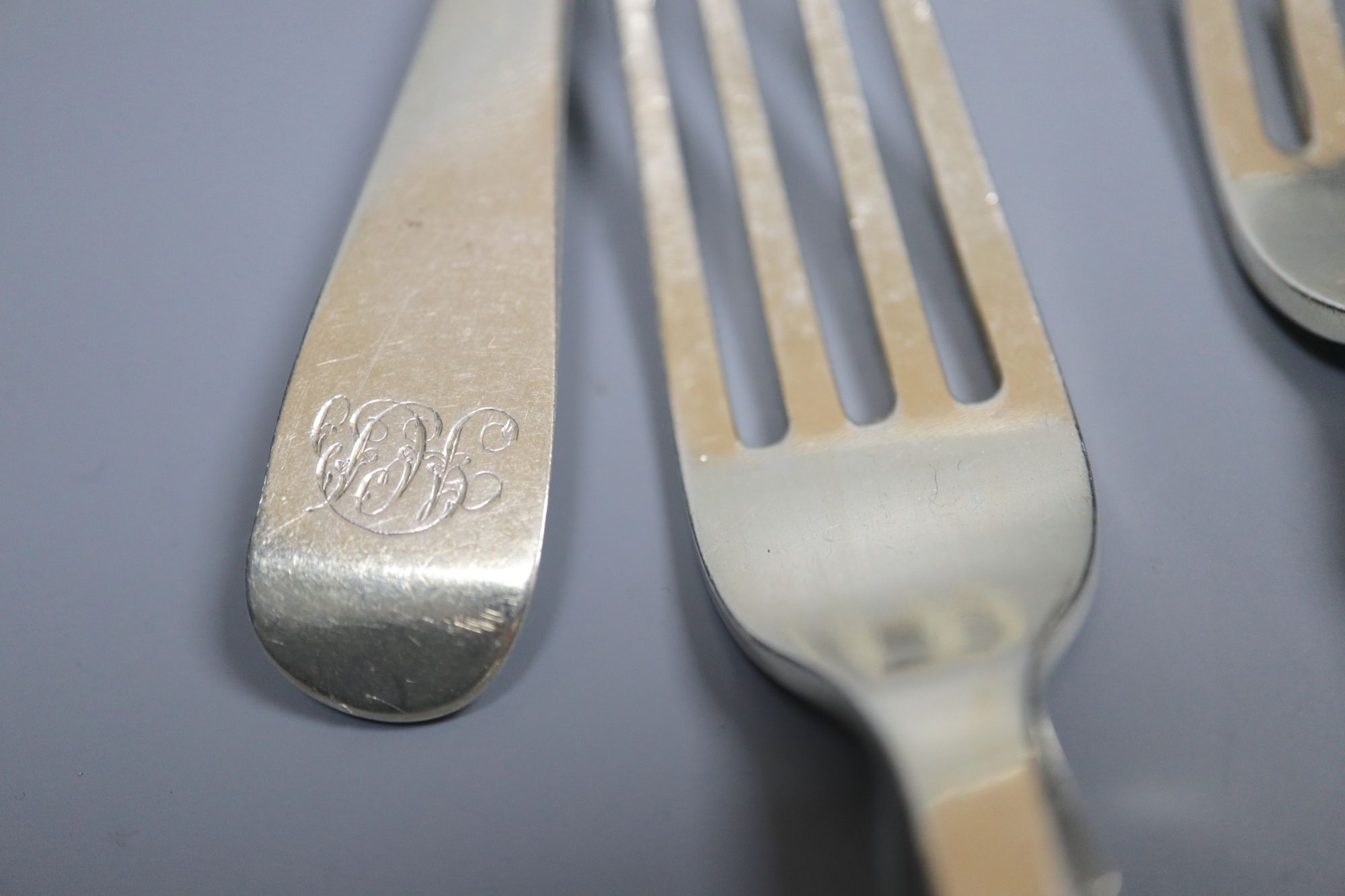 A group of assorted 19th century silver flatware including two caddy spoons (one Scottish) and a napkin ring,